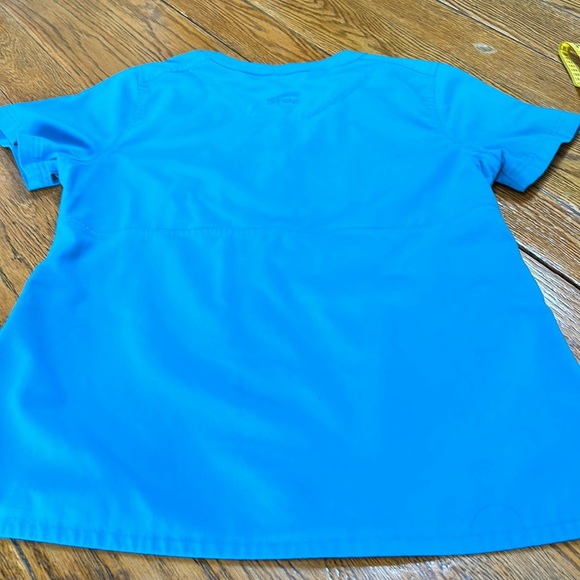 Dansko scrub top, aqua/teal size medium.  Short sleeves, pockets on side. - Picture 8 of 15